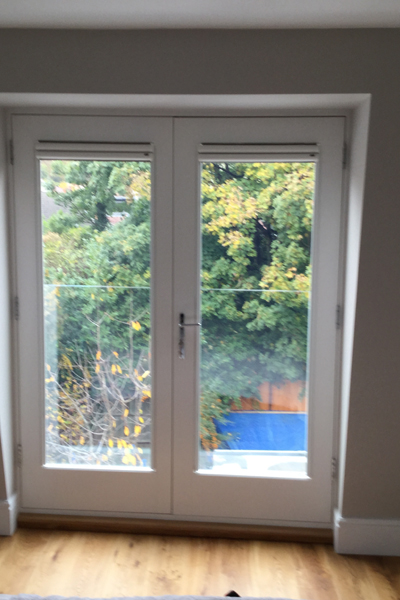 Nano blinds fitted - positioned at top of both doors