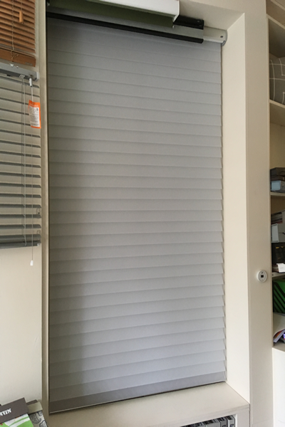Silhouette blind fully lowered in closed position