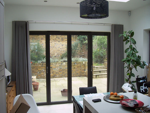 Wave system curtains stacking back neatly on chrome 30mm Silent Gliss Metropole