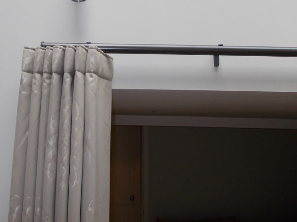 30mm Steel Grey Metropole from Silent Gliss with wave system curtains - close up left