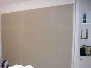 Duette blinds concealing wardrobe and shelves Muswell Hill
