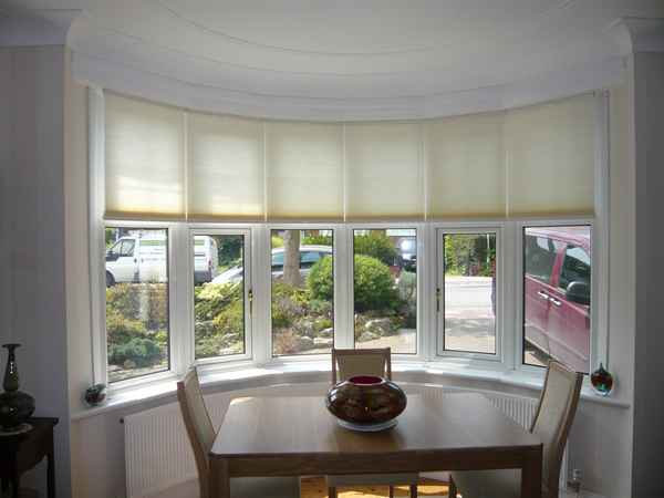 Top down - bottom up Luxaflex duette blinds at a bow window