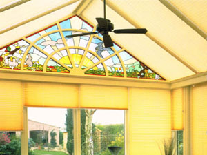conservatory with window and roof pleated  blinds and stained glass