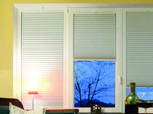 Pleated blinds attached to opening tilt and turn windows 