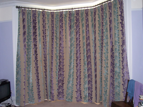 38mm two bend baypole fitted and curtains hung