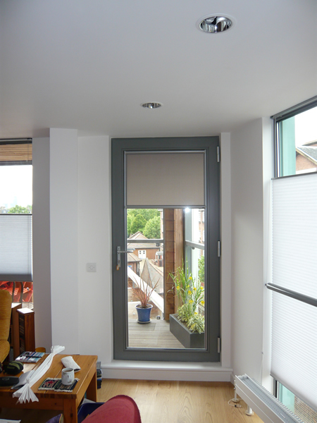 Luxaflex Nano blind fitted to a door in London, covering top third only