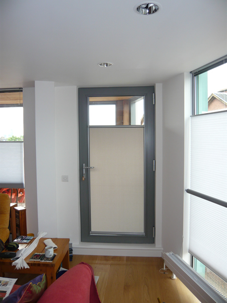 Luxaflex Nano blind fitted to a door in London, covering bottom two thirds
