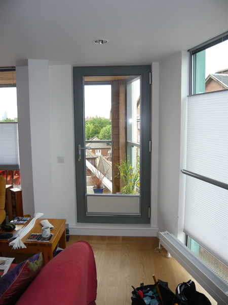 Luxaflex Nano blind fitted to a door in London, covering bottom quarter