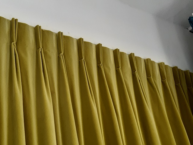 Twin Pleat curtain open - Changing Curtains Shop Display