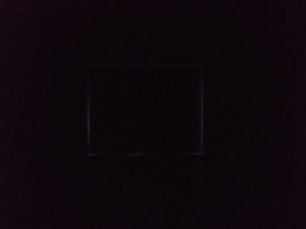 Blackout blind and side channels, photo taken without flash to demonstrate level of light exclusion