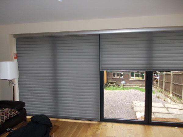 silhouette blinds fitted one fully lowered, one part raised