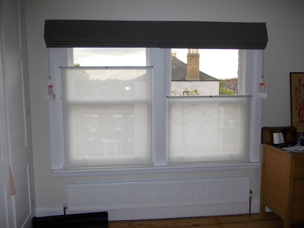 roman blinds and bottom up blinds at the same windows, bottom up blinds set at different heights